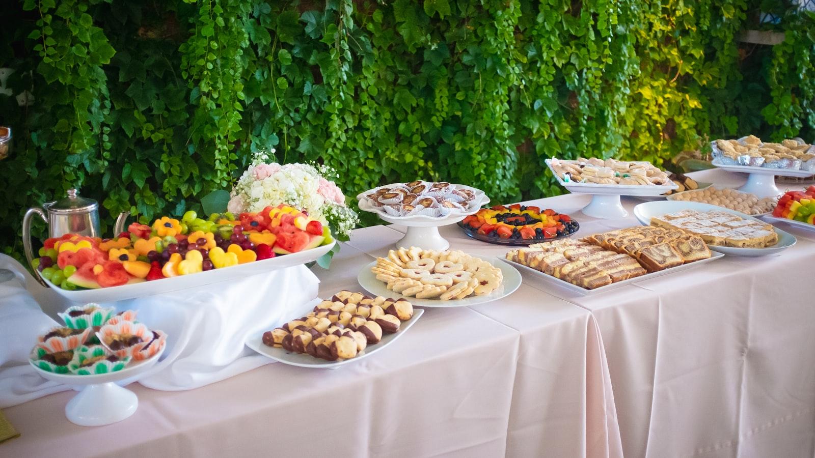 A buffet table with platters of fresh food set up for a small gathering